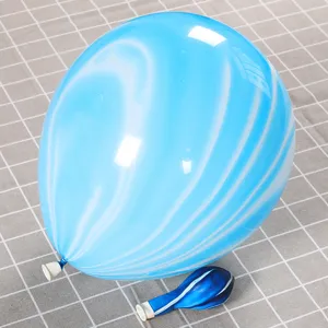 Detail showing light blue and white agate marble pattern on thickened latex balloon