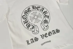 Close-up of Chrome Hearts horseshoe and gothic Las Vegas print on a white cotton T-shirt