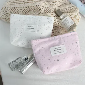 Canvas cosmetic bag with silver stars, large capacity portable makeup pouch for women and girls.