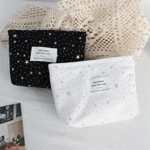 Silver star sequin cosmetic bag, portable makeup storage pouch for daily travel and touch-up use.