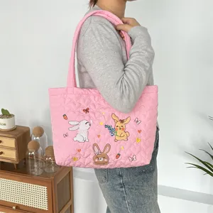 Pink quilted heart tote bag with cute rabbit embroidery, casual shoulder handbag for women.