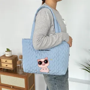Light blue quilted heart pattern tote bag for women, cute cartoon pig embroidery shoulder bag.