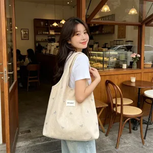 Koreaanse stijl wollen strik geborduurde schoudertas tote, veelzijdige casual handtas voor dames.