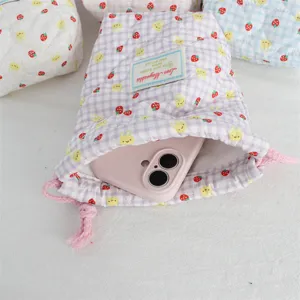 Quilted padded drawstring pouch with cute bunny and strawberry pattern, portable soft storage bag.