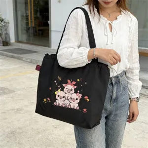 Bolso tote negro de lona para mujer con bonito patrón de cerdo bordado bolso de hombro casual.
