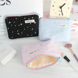 Canvas zipper pouch set with silver stars pattern, portable coin purse and makeup bag storage.