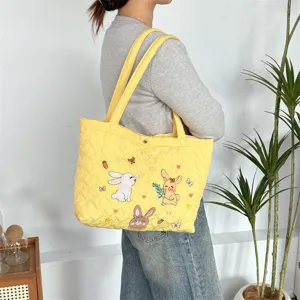 Cute quilted heart canvas tote bag for women with adorable rabbit embroidery, yellow shoulder bag.