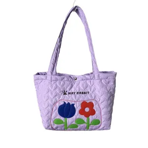 Cute quilted tote bag with heart pattern and floral embroidery, soft casual shoulder bag.
