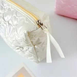 Korean PU quilted heart cosmetic bag detail, white portable toiletry and travel pouch.