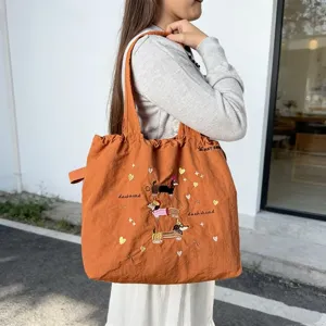 Borsa shopper arancione ricamata con bassotti grande capacità borsa a spalla casual
