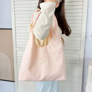 Casual pink and white striped canvas shoulder tote bag, lightweight large capacity daily student bag.