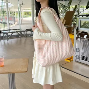 Pink striped shoulder bag for women, lightweight casual tote bag for daily shopping and travel.