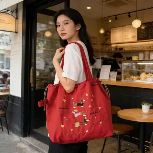 Grande borsa tote in tela rossa con ricamo di cane bassotto carino per il commuting giornaliero.