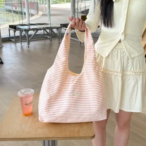 Casual pink striped shoulder bag, large capacity hobo vest bag for daily shopping.