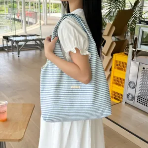 Casual striped canvas shoulder bag for women, large capacity lightweight daily shopping tote.