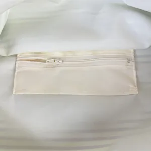 Interior zipper pocket detail of the casual striped shoulder bag, offering secure storage.