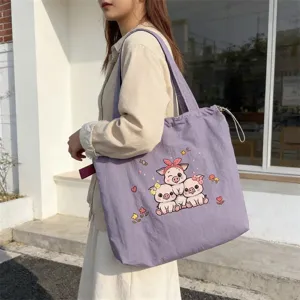 Lindo bolso tote de lona morada bordado para mujeres casual versátil estudiante diario.