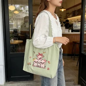 Bolso tote de lona con cerdo bordado para mujeres, bolso de hombro informal para estudiantes.