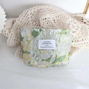 Borsa cosmetica floreale goffrata retrò portatile di grande capacità per rossetto viaggio.