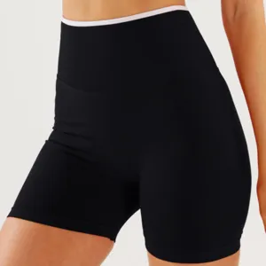 Black high waist sports shorts with colorblock waistband for yoga fitness apparel.