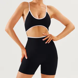 Black contrast trim activewear set, backless sports bra and high waist fitness shorts.