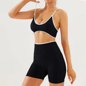 Black pink color-block activewear set, backless sports bra and high-waist yoga shorts fitness.