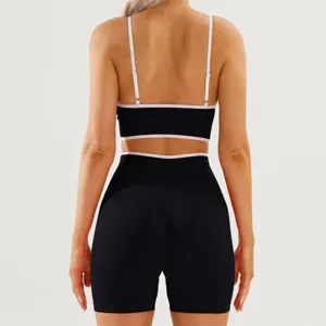 Women's colorblock workout set, open back sports bra and high waist fitness yoga shorts.