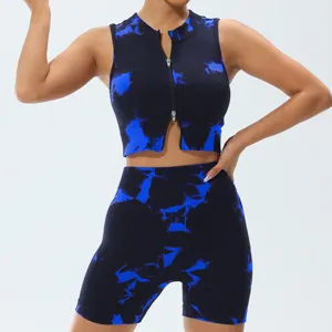 Detailed view of the blue tie-dye athletic two-piece set, featuring a front zipper top and shorts.