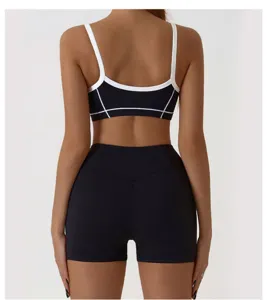 Women breathable sports bra and tight yoga shorts set, ideal for running and gym workouts.
