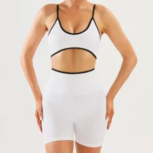 White contrast trim sports bra and high-waisted biker shorts yoga activewear set for gym workout