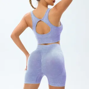 Seamless acid wash yoga set featuring a racerback sports bra and high waist butt lift shorts.