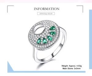 Detailansicht des 925er Sterlingsilberrings mit Zirkonia-Pavé und grünen Birnensteinen.