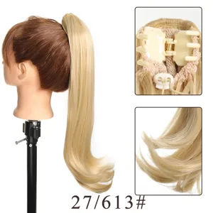 Detail view of synthetic curly claw clip ponytail extension, showing inner claw and hair texture.