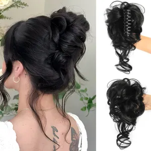 Synthetic messy hair bun claw clip hair extension detail view showing natural wavy texture black hair