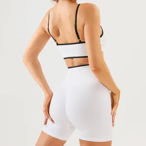 Back view detail of white ribbed sports bra and biker shorts activewear set for fitness.