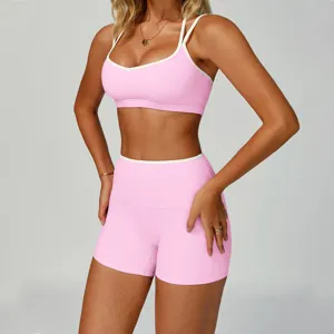 Rosa zweiteiliges Yoga-Set mit Sport-BH und hoher Taille Shorts für Damen Fitness Training.
