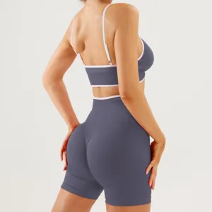 Back view detail of womens colorblock activewear set, athletic crop top and high waist shorts.