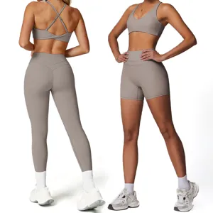 Women's activewear yoga set with supportive sports bra and high waist leggings for fitness gym.