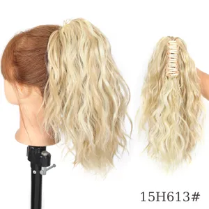 Synthetic curly claw clip ponytail extension blonde wavy hair piece for daily use.