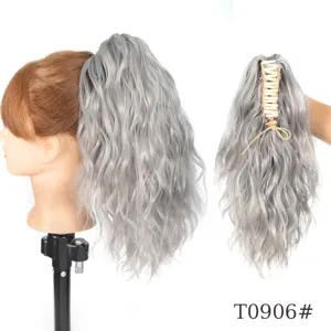 Detailed view of grey synthetic curly ponytail hair extension with claw clip for women.