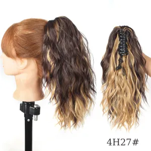Synthetic claw clip wavy ponytail hair extension detail view showing texture and clip.