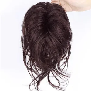 Detailed view of synthetic hair bun claw clip extension in messy dark brown ponytail style.