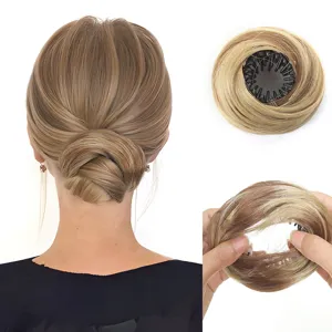 Synthetic hair bun claw clip extension, gradient brown scrunchie updo hairpiece detail view.