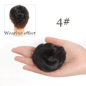 Chignon postiche cheveux synthetiques detail montrant volume naturel et belle couleur.