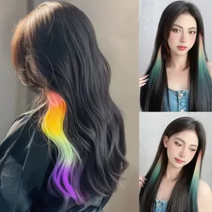 Detailed view of clip-in hair extensions featuring vibrant rainbow gradient highlights for styling.