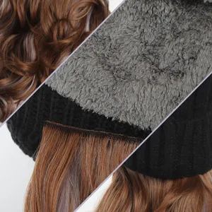 Winter warm knitted hat with synthetic long wavy wig hair, stylish two-in-one design.