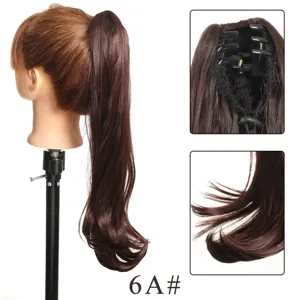Synthetic hair ponytail extension detail showing secure claw clip and natural wavy ends.