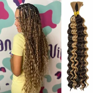 Extensions de cheveux synthétiques ondulés 46cm 160g ombrés bruns et blonds tressés.