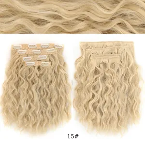 Extension capelli ricci sintetici con clip bionde ciocche di capelli vista dettaglio