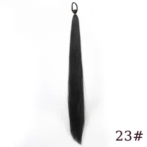 Detailed view of black synthetic hair extension braid with hair tie, fine texture strand.